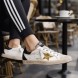 Женские кеды Golden Goose Super-Star In Nappa Leather With Gold Glitter Star And Black Glitter Heel tab